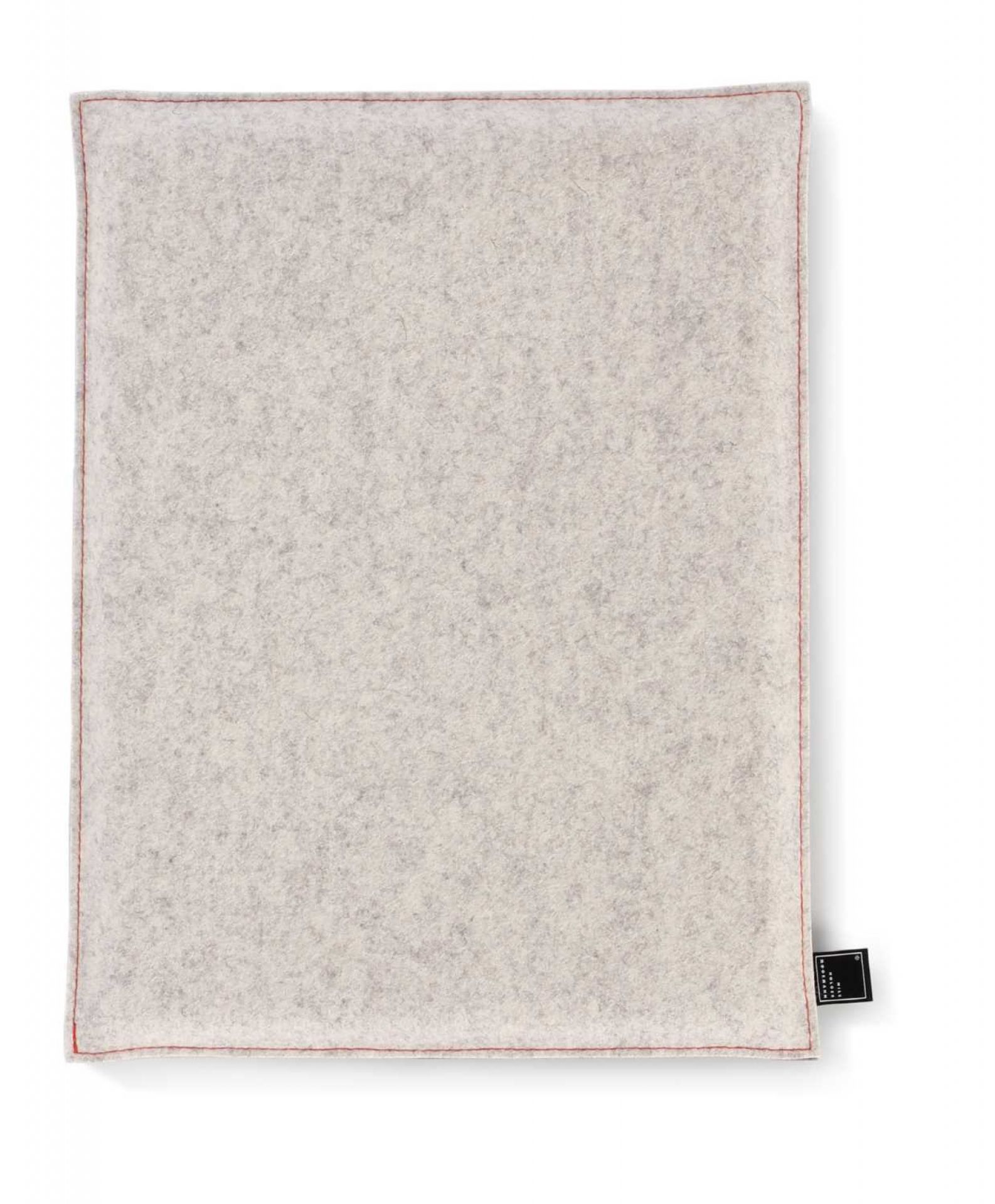 Graues Sitzkissen von Nils Holger Moormann, Setzen 6, mit roter Naht. Filzkissen für bequemes Sitzen.